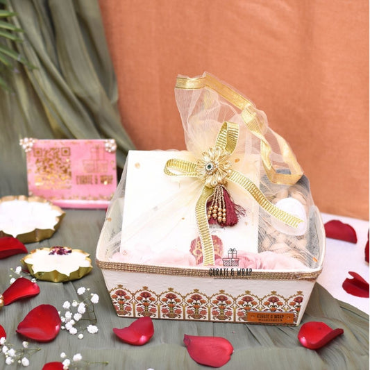 Flower Basket Hamper with brownies, assorted nuts & chocolate dragees jars, and tea lights – Curate and Wrap Dubai