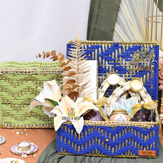 Rustic Luxe Basket in green & blue with jute woven box, assorted brownies, tea lights, gourmet nuts & Karak spice tea – luxury Diwali and corporate gift in Dubai & UAE