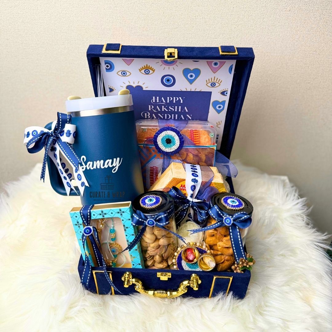 Gift basket with Raksha Bandhan-themed items on a white surface