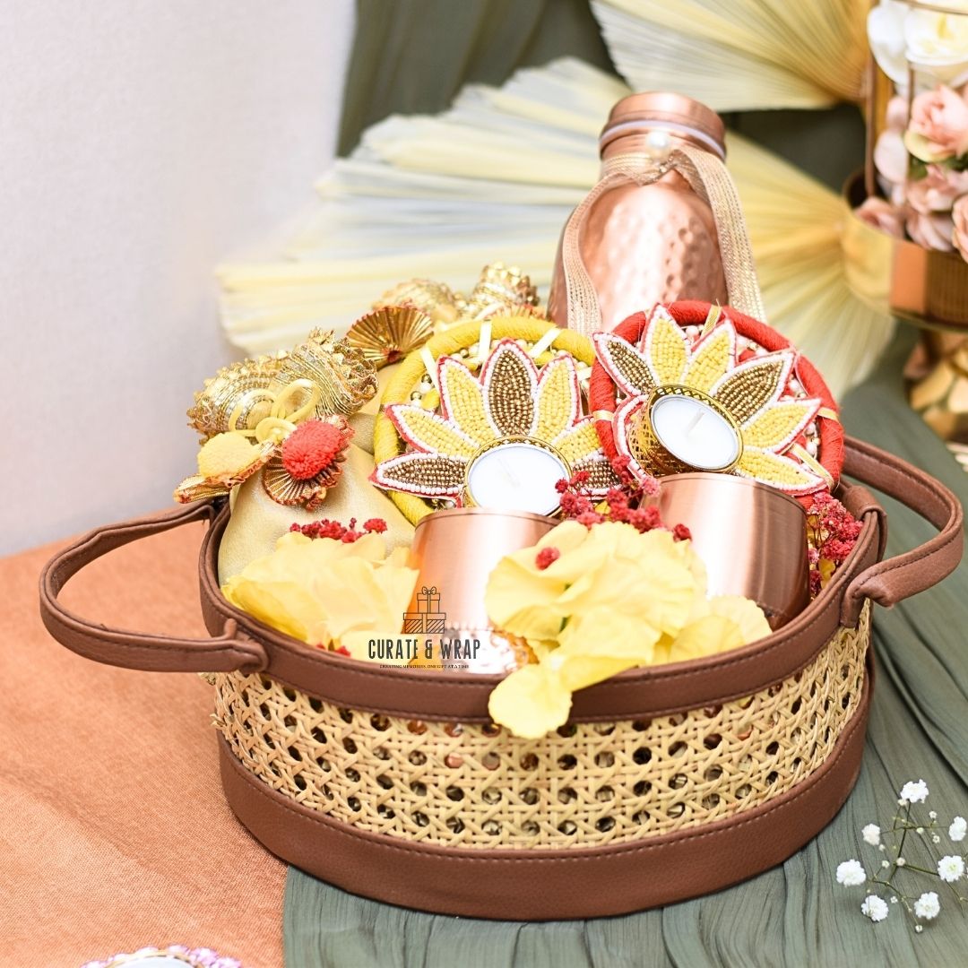 Premium Rattan Vintage Basket with vegan leather, copper bottle with glasses, decorated tea lights, and gourmet nuts – luxury personal, corporate & family gift in Dubai