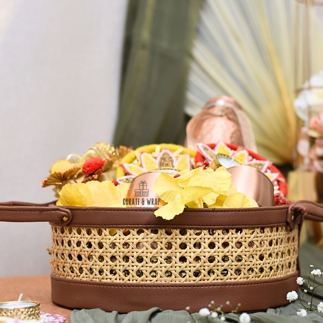 Premium Rattan Vintage Basket with vegan leather, copper bottle with glasses, decorated tea lights, and gourmet nuts – luxury personal, corporate & family gift in Dubai