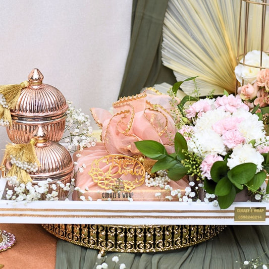 Legend Hamper with rose gold jars of gourmet nuts, premium tray, Bateel cookies, and fresh flower arrangement – luxury personal, corporate & family gift in Dubai & UAE