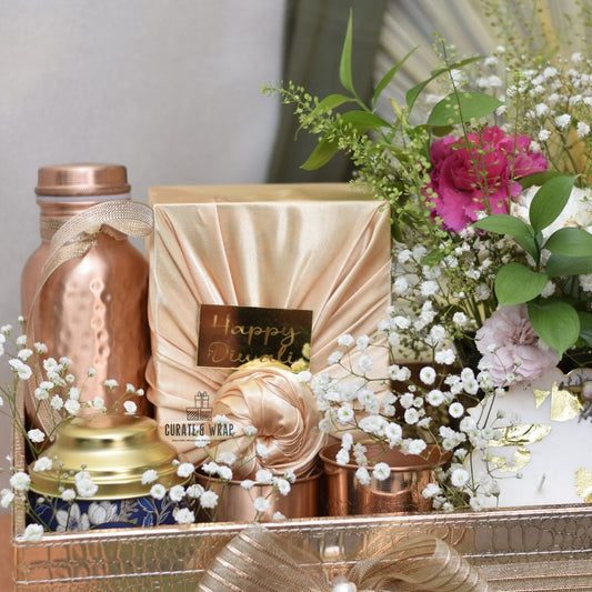Rose Gold Jumbo Basket Hamper with copper bottle & glasses, S’ya tea, fabric-wrapped mithai/nuts, and fresh flowers – luxury personal, corporate & family gift in Dubai & UAE