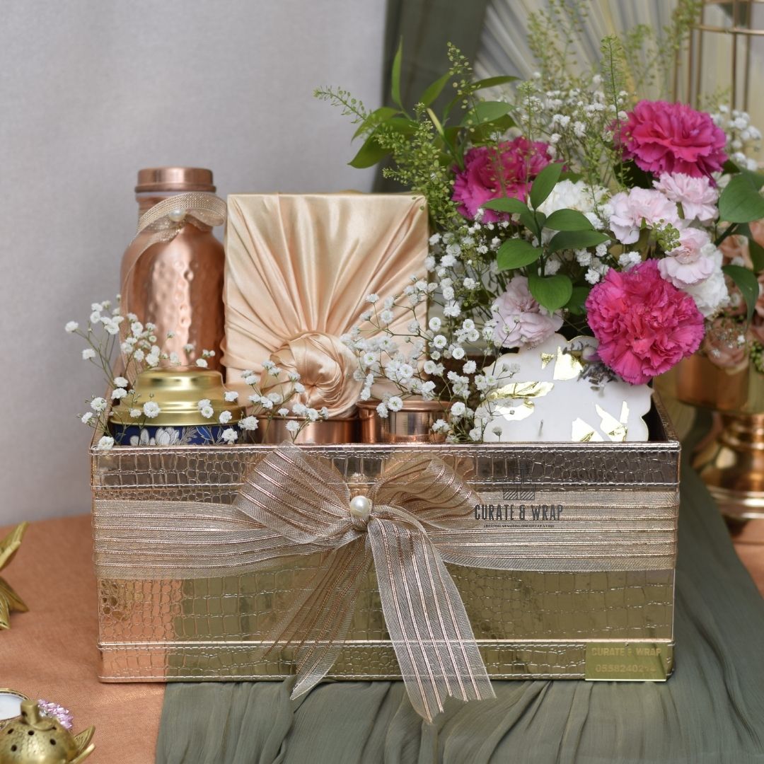 Rose Gold Jumbo Basket Hamper with copper bottle & glasses, S’ya tea, fabric-wrapped mithai/nuts, and fresh flowers – luxury personal, corporate & family gift in Dubai & UAE