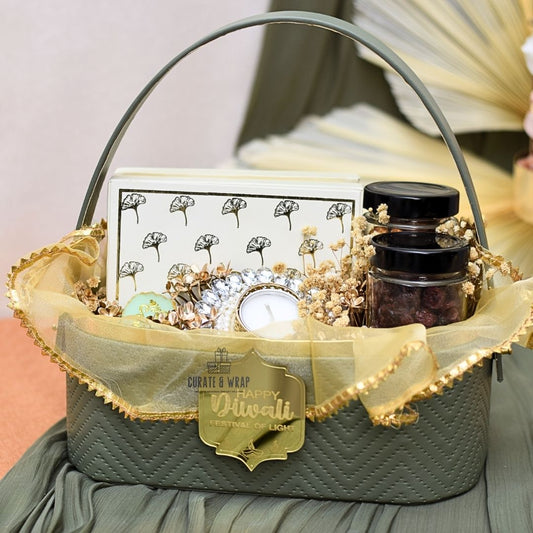 Festive Aura Basket in olive green and golden with assorted brownies, tea lights, and gourmet nuts – luxury personal, corporate & family Diwali gift in Dubai