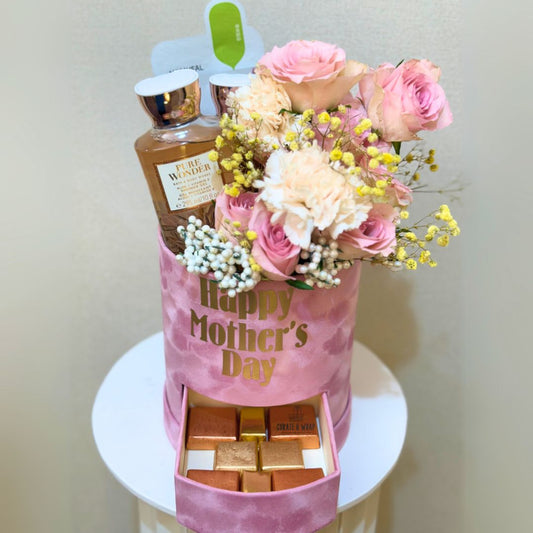 Luxury Mother's Day hamper with fresh flowers in Dubai by Curate and Wrap