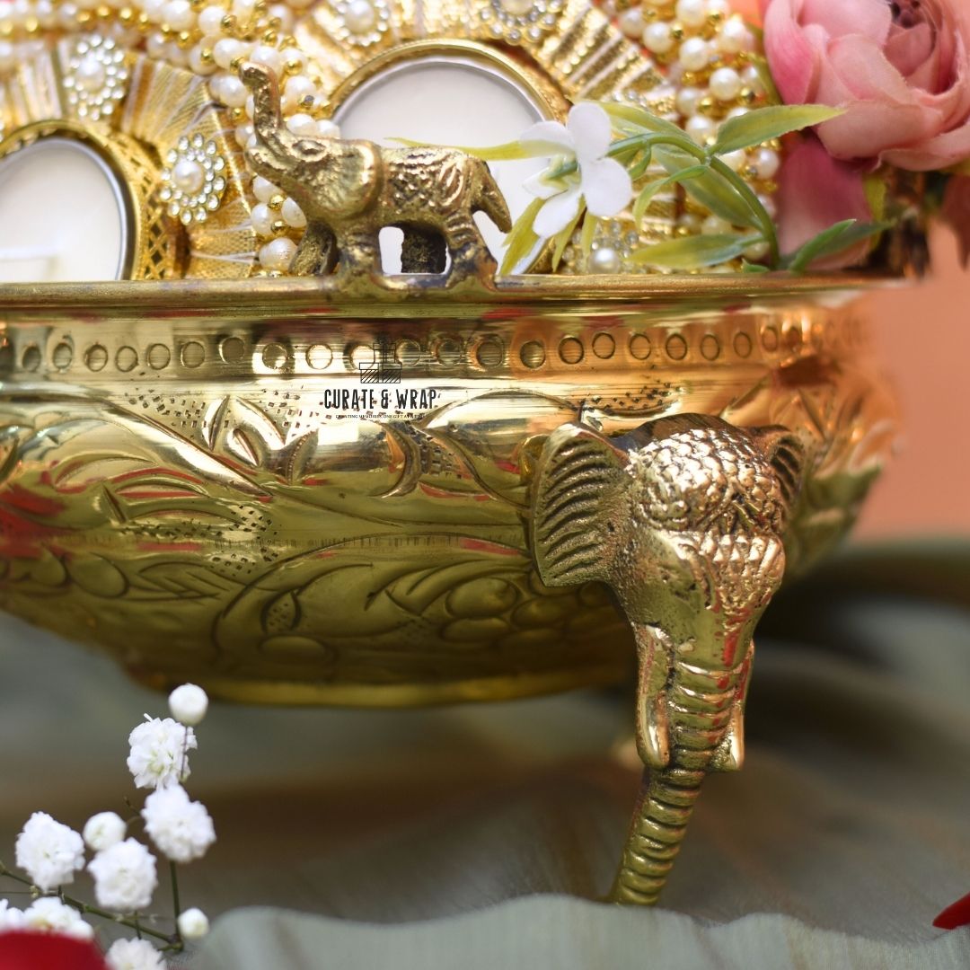 Elephant Brass Urli Hamper with premium dry fruits, brass urli, and tea lights – Curate and Wrap Dubai