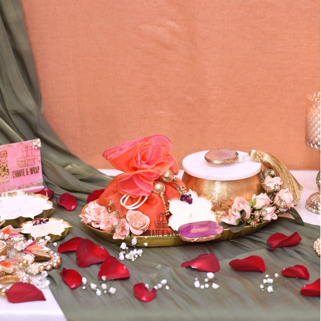 Golden Legacy Hamper with agate metal tray, marble jar of nuts, organza potli, and lotus urli soy wax candle – Curate and Wrap Dubai