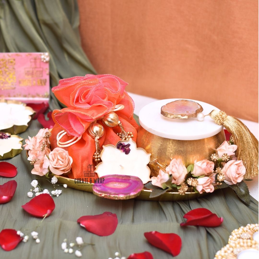 Golden Legacy Hamper with agate metal tray, marble jar of nuts, organza potli, and lotus urli soy wax candle – Curate and Wrap Dubai