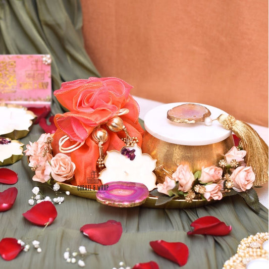 Golden Legacy Hamper with agate metal tray, marble jar of nuts, organza potli, and lotus urli soy wax candle – Curate and Wrap Dubai