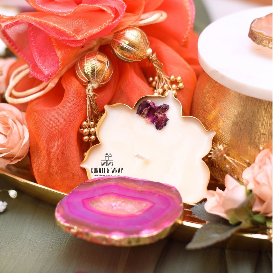 Golden Legacy Hamper with agate metal tray, marble jar of nuts, organza potli, and lotus urli soy wax candle – Curate and Wrap Dubai