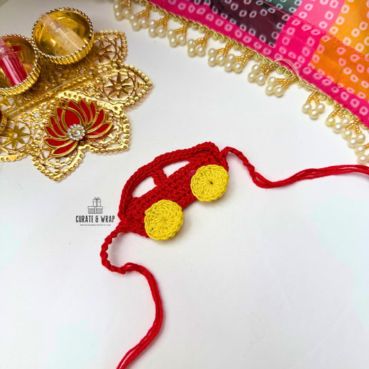 Product Code: K012-  Red Car Crochet Rakhi