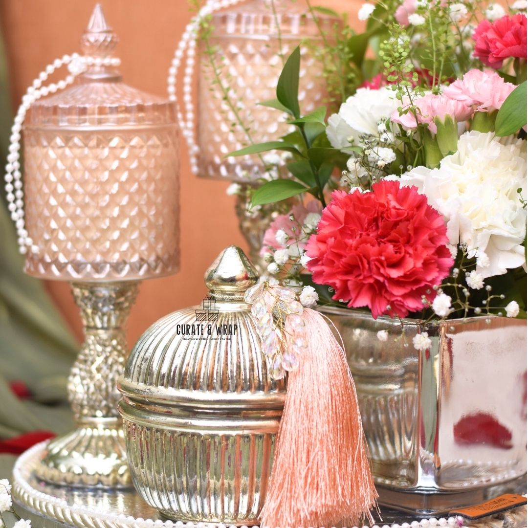 Eternal Glow Hamper with silver leatherette platter, tall glass jar candles, fresh flowers in vase, and assorted nuts – Curate and Wrap Dubai