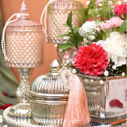 Eternal Glow Hamper with silver leatherette platter, tall glass jar candles, fresh flowers in vase, and assorted nuts – Curate and Wrap Dubai