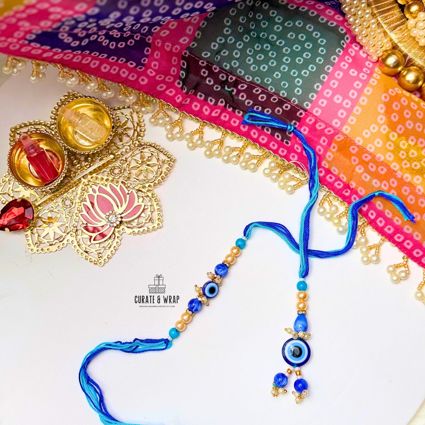 Product Code: BB016 - Pearl Evil Eye Rakhi Set