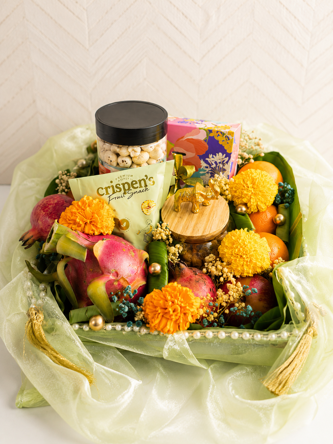 Onam gift hamper Dubai with dry fruits banana chips and makhana