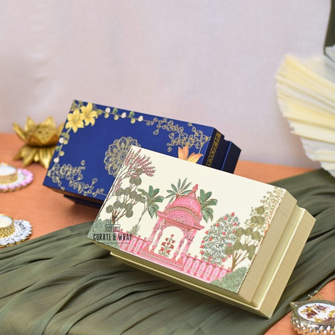 Decorative boxes with artistic designs on a textured surface