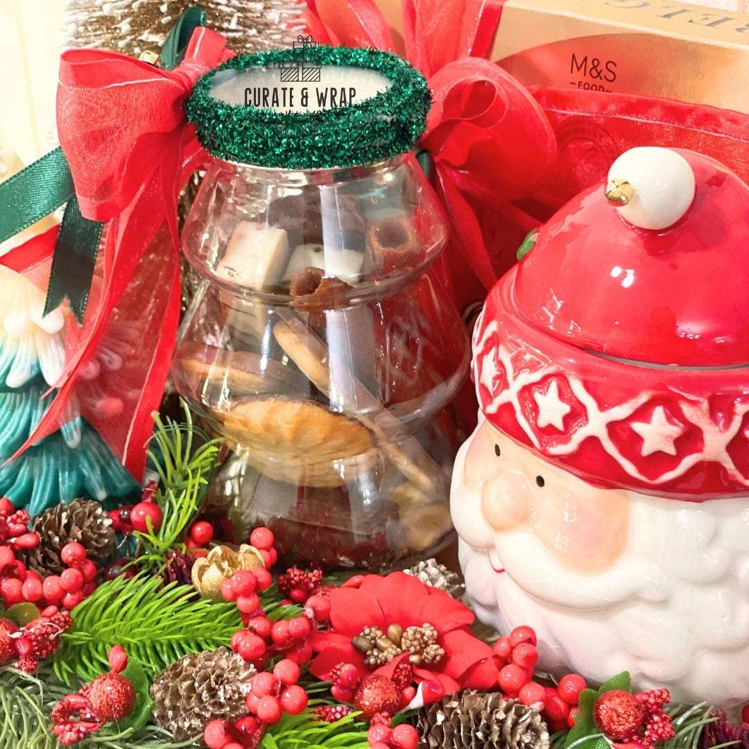 "Elegant Christmas gift box with M&S chocolates and decorations Dubai"