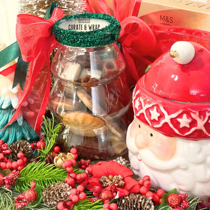 "Elegant Christmas gift box with M&S chocolates and decorations Dubai"