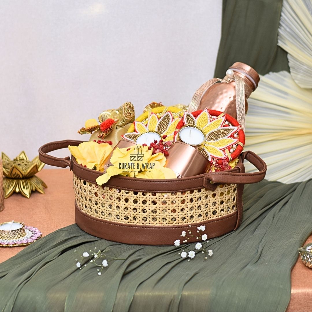 Premium Rattan Vintage Basket with vegan leather, copper bottle with glasses, decorated tea lights, and gourmet nuts – luxury personal, corporate & family gift in Dubai