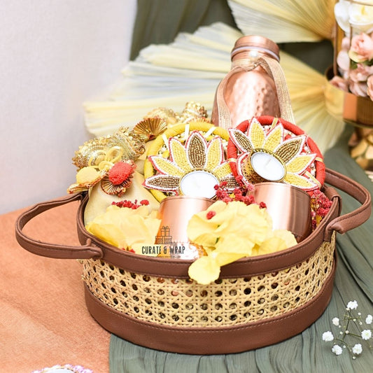 Premium Rattan Vintage Basket with vegan leather, copper bottle with glasses, decorated tea lights, and gourmet nuts – luxury personal, corporate & family gift in Dubai