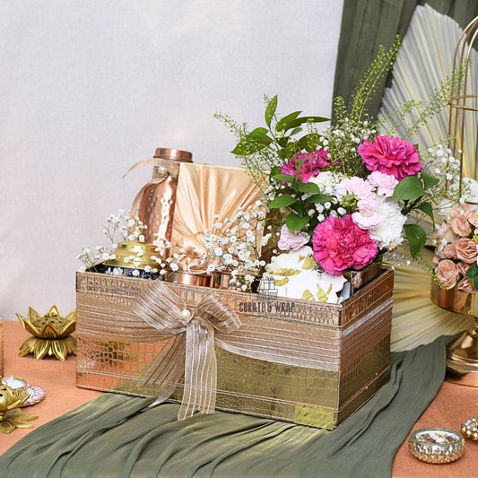 Rose Gold Jumbo Basket Hamper with copper bottle & glasses, S’ya tea, fabric-wrapped mithai/nuts, and fresh flowers – luxury personal, corporate & family gift in Dubai & UAE