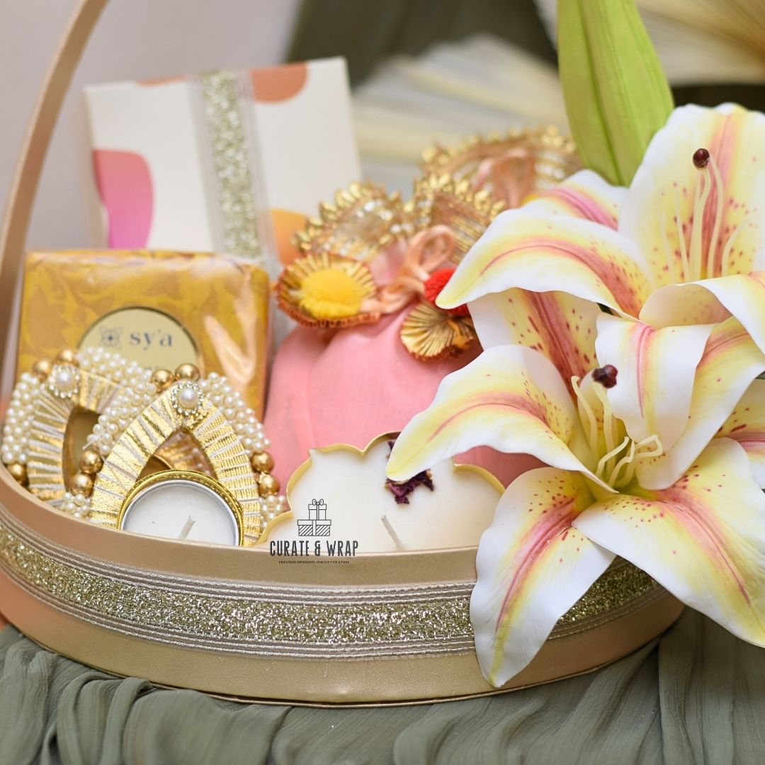 Lily Flower Basket Hamper in gold with mini brownies, premium tea, tea lights, gourmet nuts, and lotus candle – luxury personal, corporate & family gift in Dubai