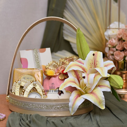Lily Flower Basket Hamper in gold with mini brownies, premium tea, tea lights, gourmet nuts, and lotus candle – luxury personal, corporate & family gift in Dubai