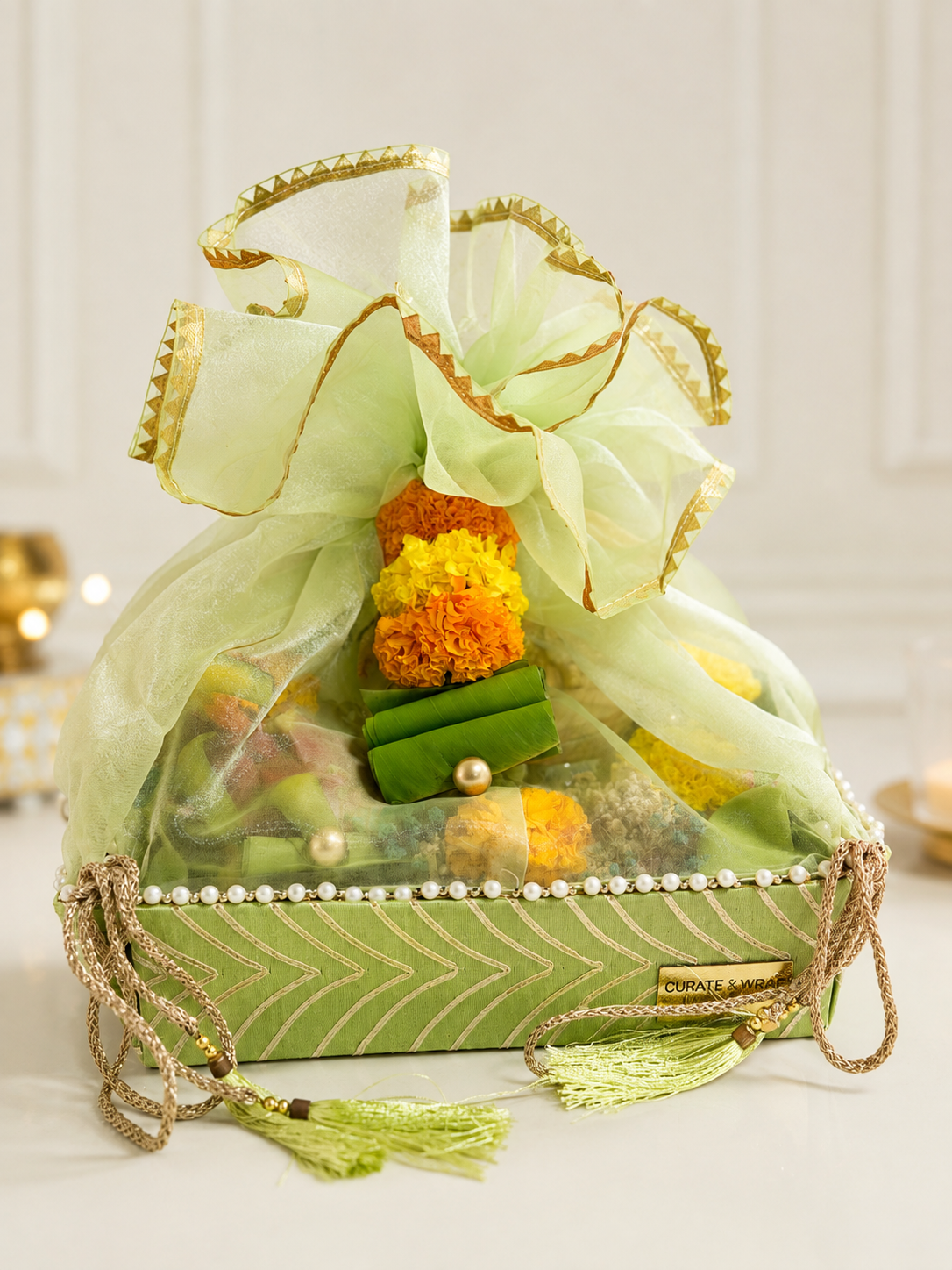 Luxury Onam gift hamper with fresh fruits and Urli candle Dubai