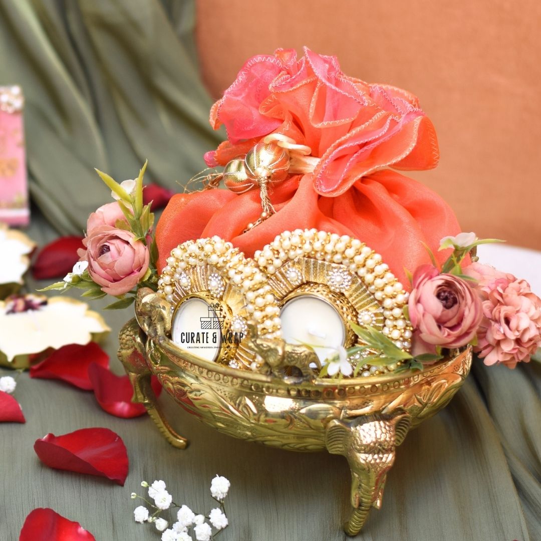 Elephant Brass Urli Hamper with premium dry fruits, brass urli, and tea lights – Curate and Wrap Dubai
