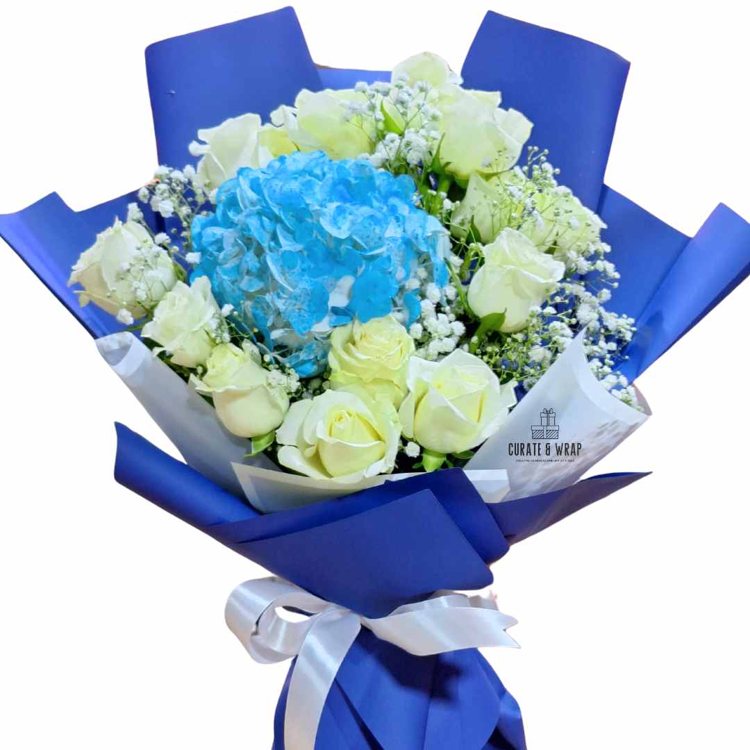 Cloud Bloom hand bouquet with white roses and blue hydrangea – Curate and Wrap Dubai