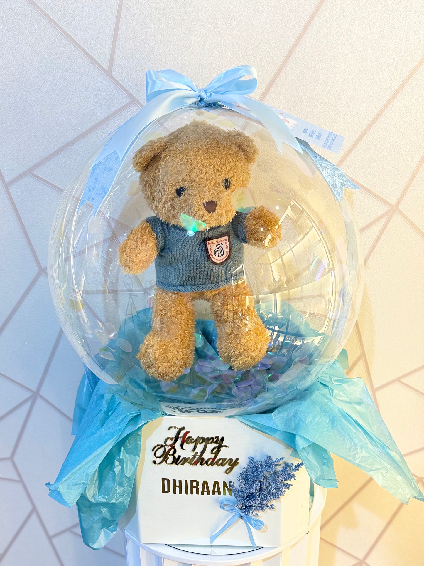 Teddy In Bobo Balloon Hamper – luxury gift hamper featuring a teddy bear encased in a transparent balloon by Curate and Wrap, Dubai