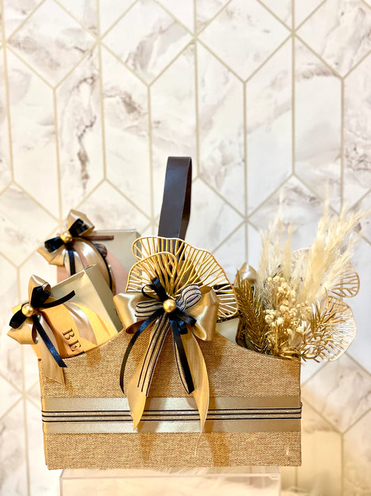 Luxury Brown Goodie Basket curated with premium treats, elegant packaging, perfect for gifting in Dubai by Curate and Wrap.