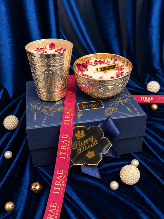Itrae Home Silver Nakashi scented candle gift set displayed on a premium navy blue box with gold lotus detailing and Happy Diwali tag