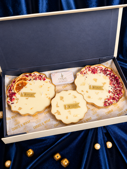Itrae Home Padma Box featuring three gold metal Urli scented candles in 4.5-inch and 3.5-inch sizes, arranged in a luxury ivory gift box