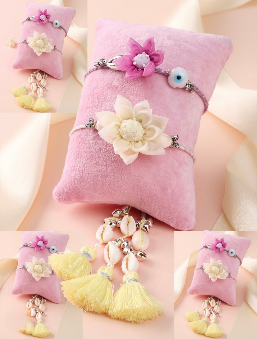 A pink velvet ring pillow decorated with a large cream flower, a pink fabric flower, a blue evil eye bead, and dangling yellow tassels, shown with inset views of the same item on a soft beige background.