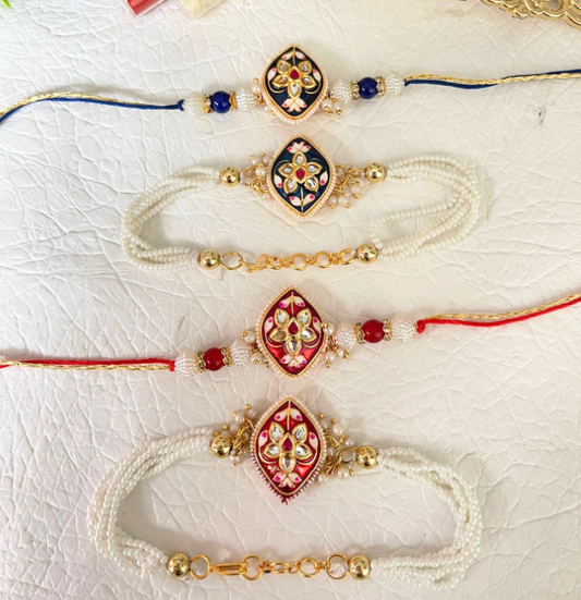 Product Code: BB019 - Navy Blue Meenakari Rakhi Set BB020 - Red Meenakari Rakhi Set