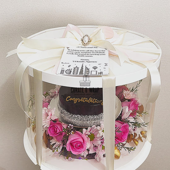 luxury cake hamper UAE, cake and flower box Dubai, celebration hamper UAE, Curate and Wrap cake gift, premium birthday gift, elegant flower cake hamper, Dubai luxury gifting