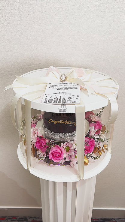 luxury cake hamper UAE, cake and flower box Dubai, celebration hamper UAE, Curate and Wrap cake gift, premium birthday gift, elegant flower cake hamper, Dubai luxury gifting